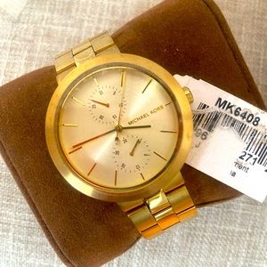 Brand New Gold Michael Kors Watch 

Needs battery replacement